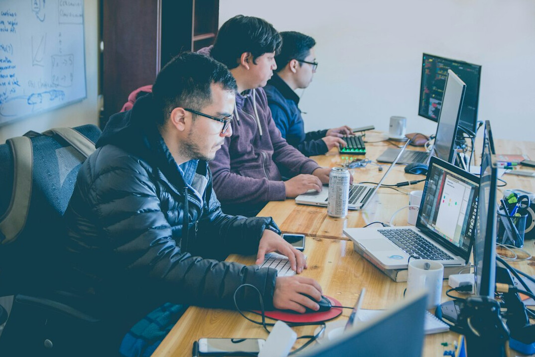 group of programmers collaborating