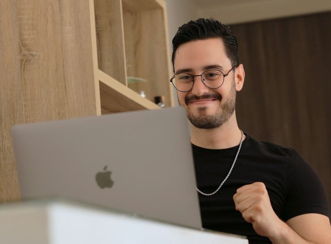 successful programmer smiling