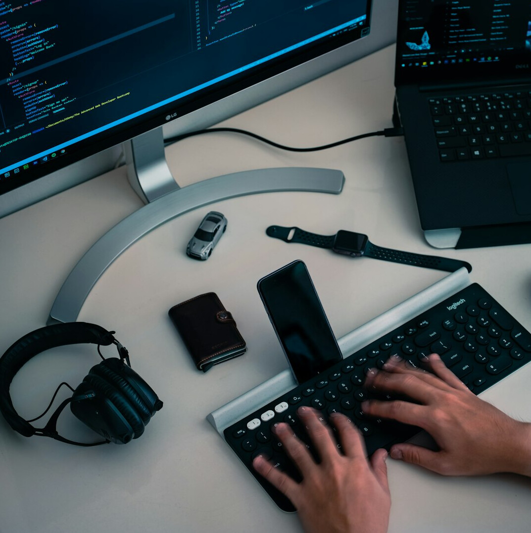 person writing code on computer
