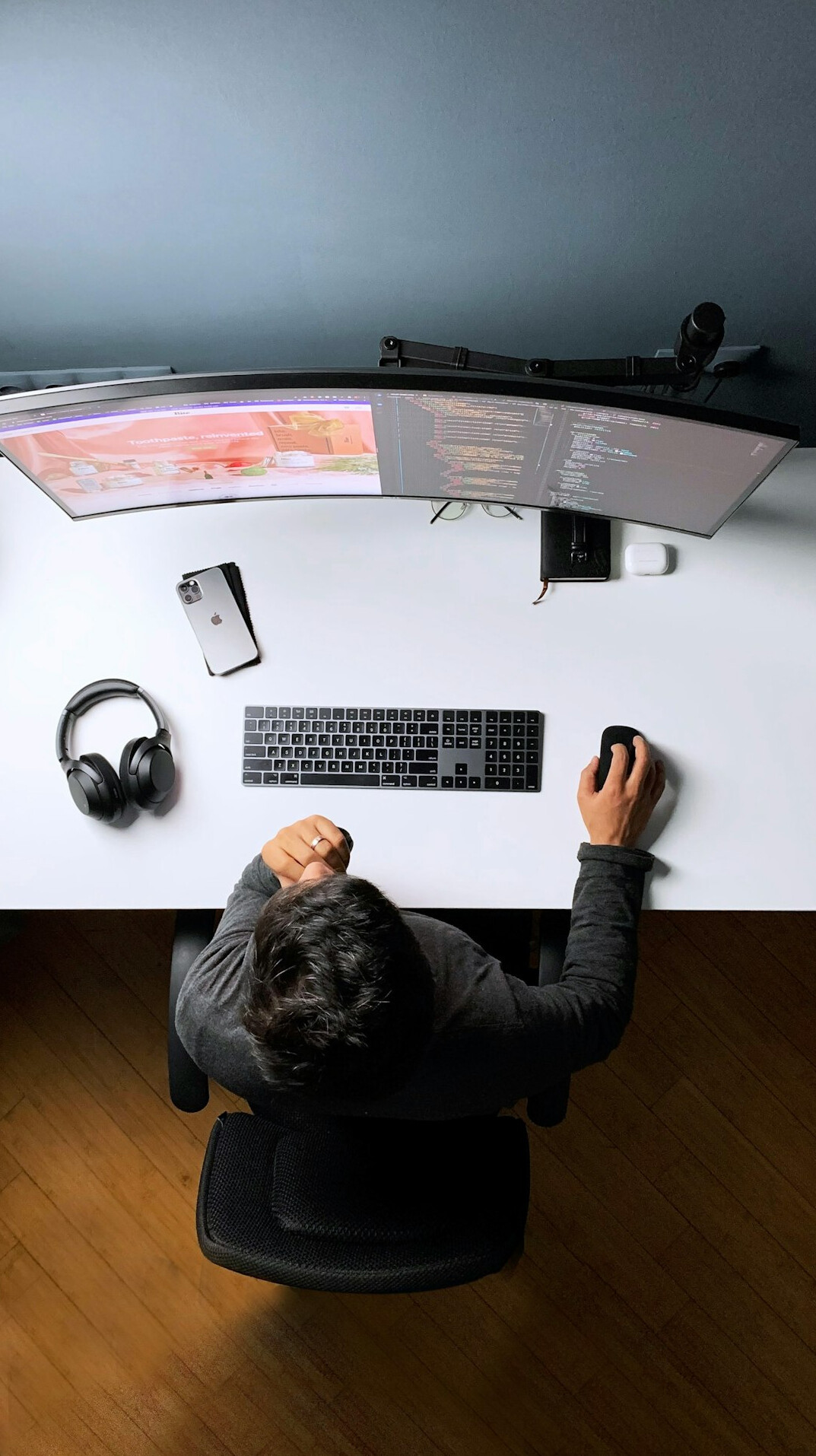 successful programmer at desk